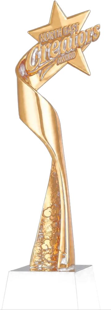 The North East Creators Award trophy — a gold star rising on a spiralling column